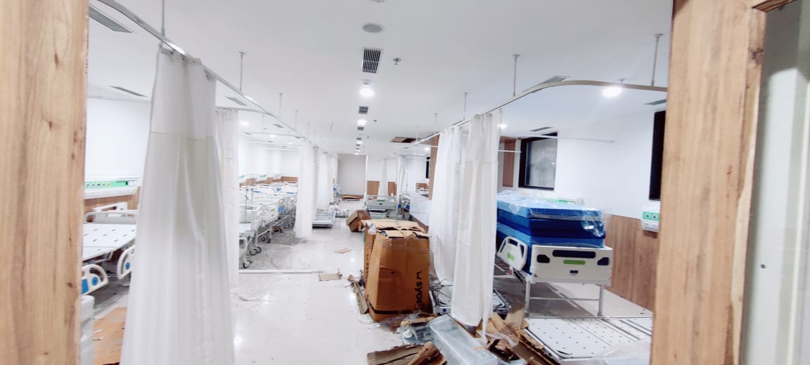 Hospital ward curtains during installation